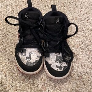 Nike air Jordan worn a few times red and black news pattern in good condition